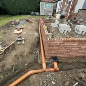 New drainage pipework installed in trenches at a new build development in Greater Manchester