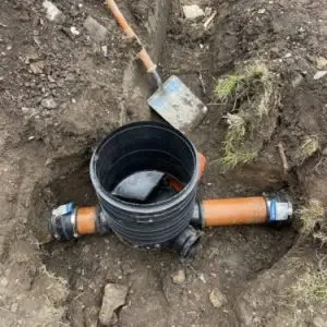 Drain inspection chamber base and connections during commercial drain installation works