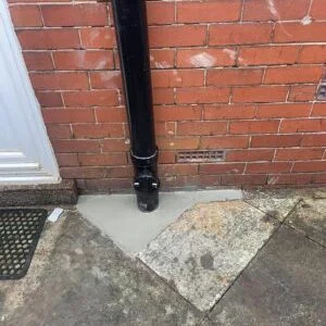 Soil stack base resealed and made good during drain repairs in Greater Manchester